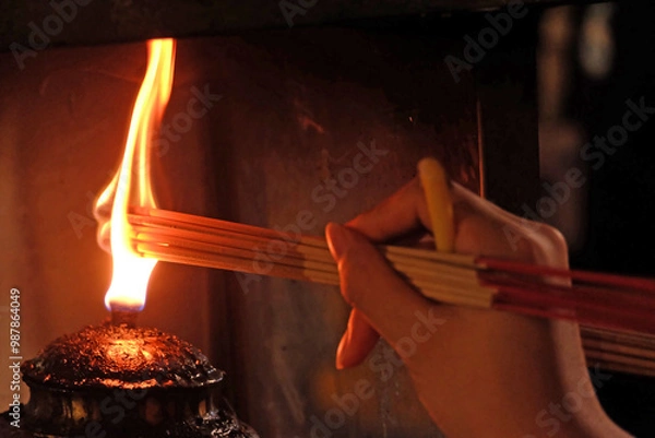 Obraz burning incense in the fireplace