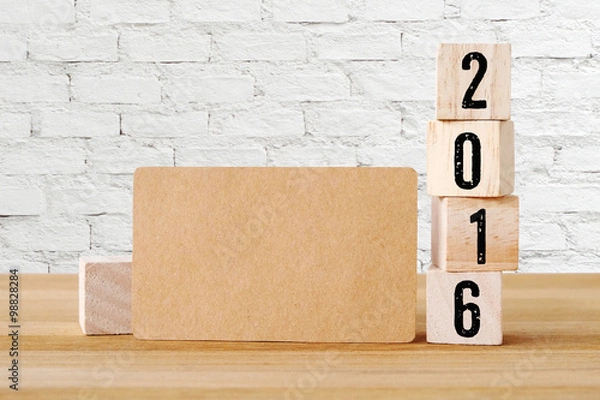Fototapeta Blank card and wood cubes with 2016, new year background