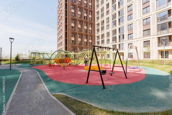 Fototapeta children's playground on the territory of an apartment building