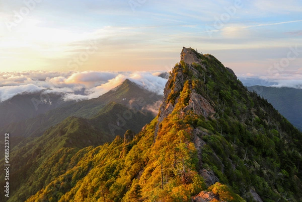 Obraz 朝日に染まる石鎚山頂上