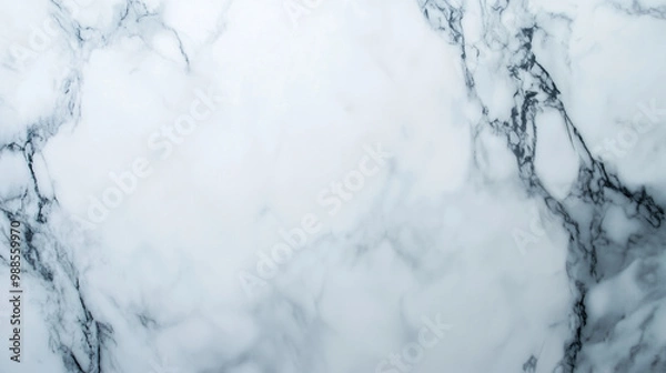 Fototapeta A smooth marble texture in shades of gray and white, giving a sense of luxury and sophistication.
