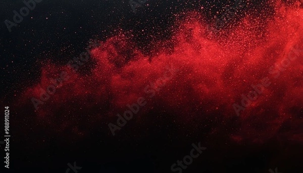 Obraz A vibrant red powder explosion against a dark background, creating an abstract and dramatic visual effect.