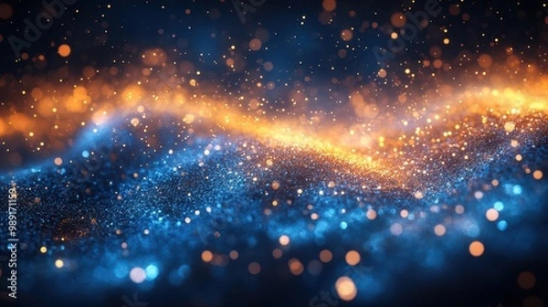 Fototapeta mesmerizing abstract composition of swirling blue and gold particles evokes celestial bodies and new years festivities dreamy bokeh effect adds depth and magic to the scene