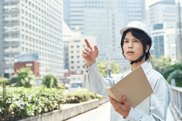 Fototapeta 作業着の男性