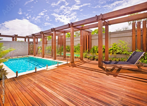 Fototapeta A beautiful view of pool in house in  a sunny day
