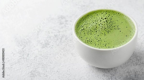 Fototapeta Fresh Matcha Green Tea in White Bowl