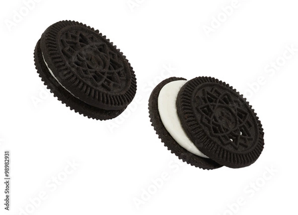Obraz Close up isolated black cookies like oreo against hite background, computer ggenerated image in high definition