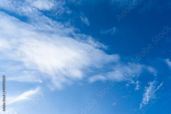 Obraz blue sky with wispy white clouds