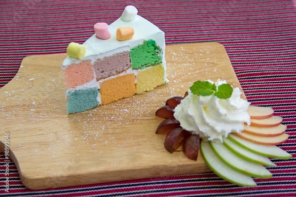 Obraz colorful rainbow cake top with marshmallows