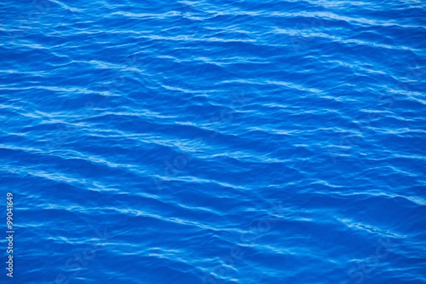 Fototapeta Blue sea surface with waves