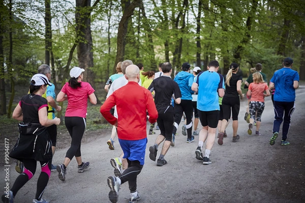 Obraz Young runners in the park