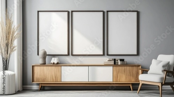 Fototapeta Minimalist Living Room with Blank Canvas Frames