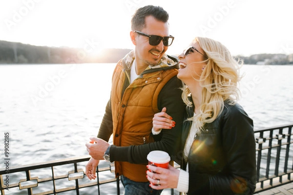 Obraz Happy In love couple smiling and hugging eachother outdoor 