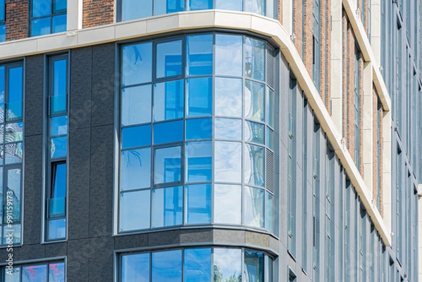 Fototapeta Facade of a modern residential building, building texture