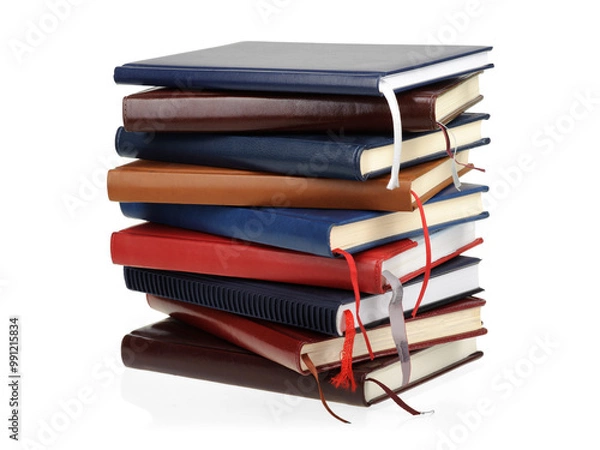 Obraz Stack of diaries or books with colorful covers on white background