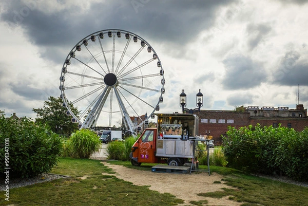 Obraz  Ferris wheel and Gdansk sign at Motlawa river - Gdansk, Poland