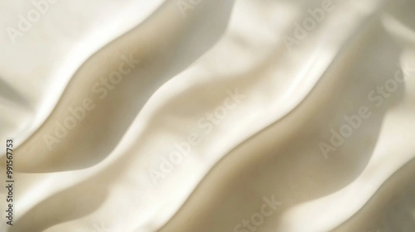 Obraz This image features abstract wavy patterns in soft beige and cream color tones, creating a smooth and calming visual effect that's perfect for backgrounds or designs.