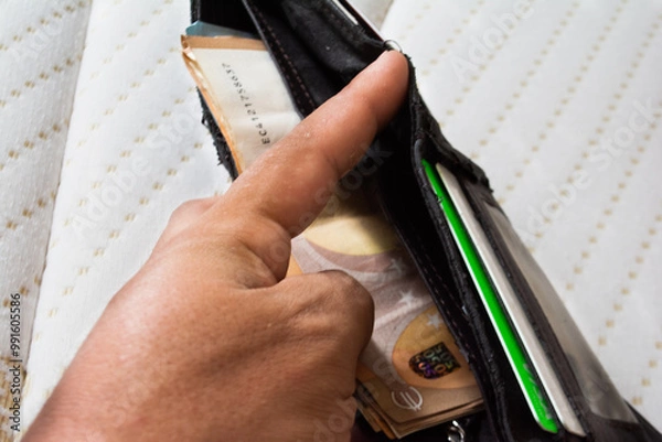 Fototapeta European banknotes in an open wallet in an upright position