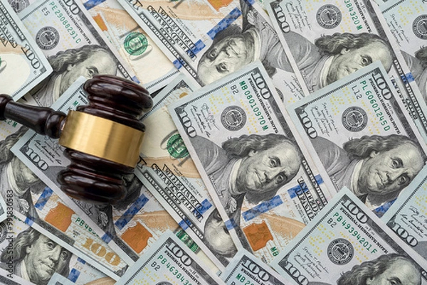 Obraz Judges  gavel on heap of us money. Dolar background. Justice concept