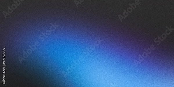 Fototapeta A black banner backdrop with a grainy, dark texture highlighted by a radiant blue abstract noise pattern, offering copy space for additional content
