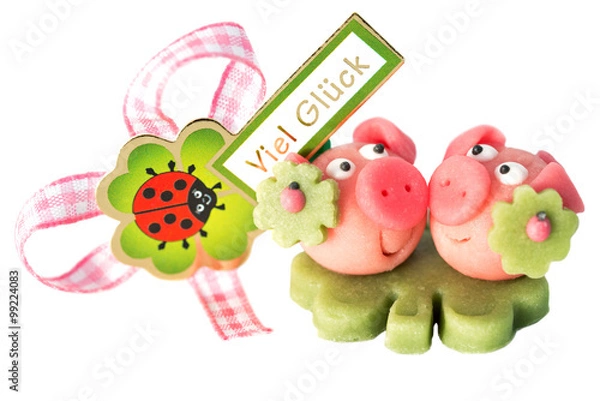 Obraz Two marzipan pigs with cloverleaf and good luck (in German) written on a background