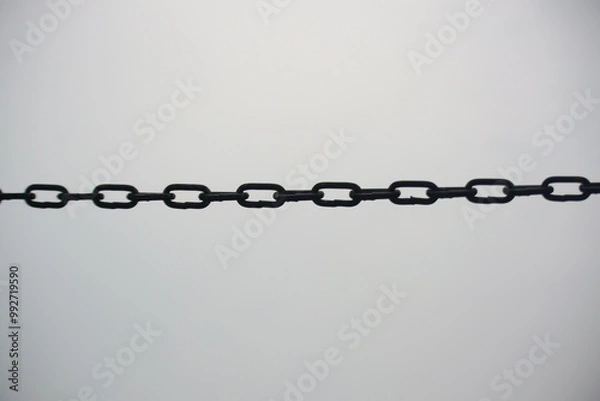Fototapeta Straight iron chain with plain background