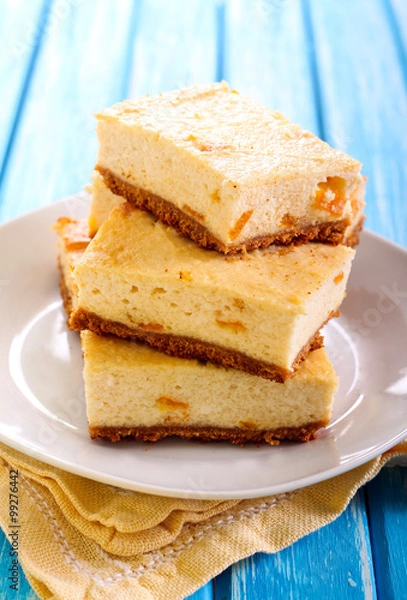 Fototapeta Citrus Cheesecake slices on plate