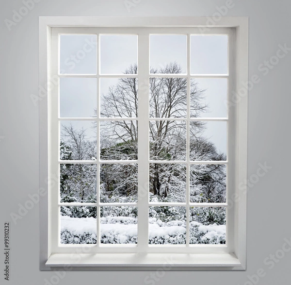 Obraz Okno mieszkalne ze śniegiem i drzewami