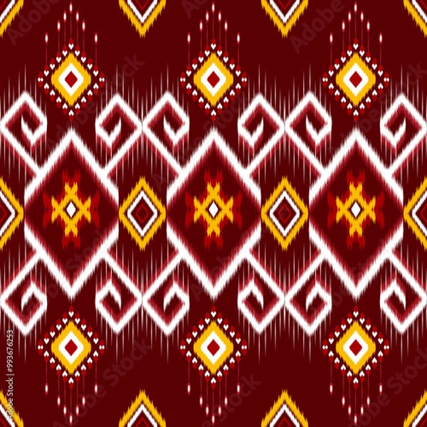 Fototapeta This high resolution image features a traditional geometric ikat pattern in vibrant colors, perfect for use in fashion designs, digital backgrounds, ethnic art projects, and as decorative prints.
