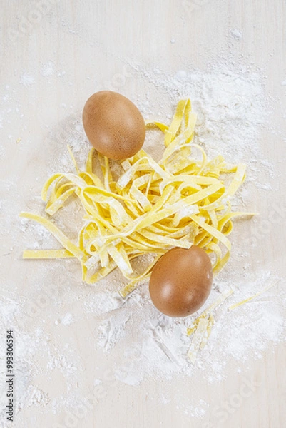 Fototapeta tagliatelle with eggs and flour