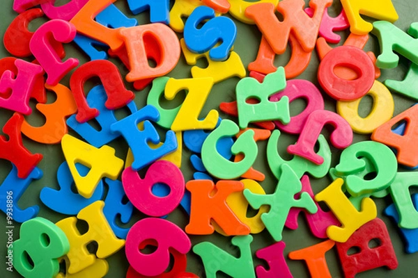 Fototapeta A grouping of plastic letter magnets forming a background