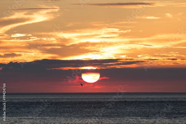 Obraz 海に沈む夕日