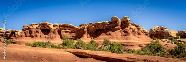 Fototapeta Panorama of Tapestry Arch in Arches National Park. Tapestry Arch in Arches National Park is a stunning sandstone formation characterized by its unique shape. 