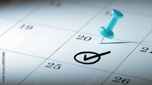 Fototapeta Concept image of a Calendar with a blue push pin. Closeup shot o