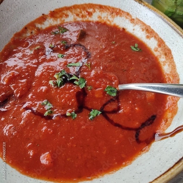 Fototapeta tomato soup with basil
