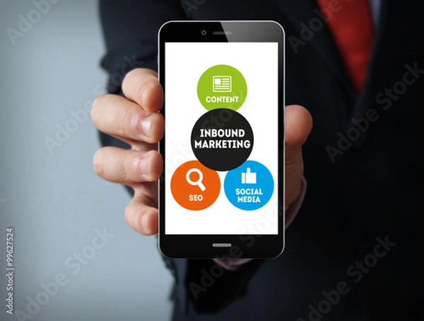 Fototapeta Inbound marketing graphic on the screen businessman smartphone