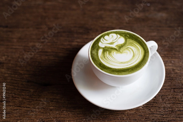 Fototapeta matcha green tea latte with latte art in rose pattern