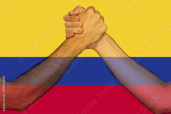 Fototapeta Two hands gathering front of Colombia flag, help or support for Colombia, togetherness and 