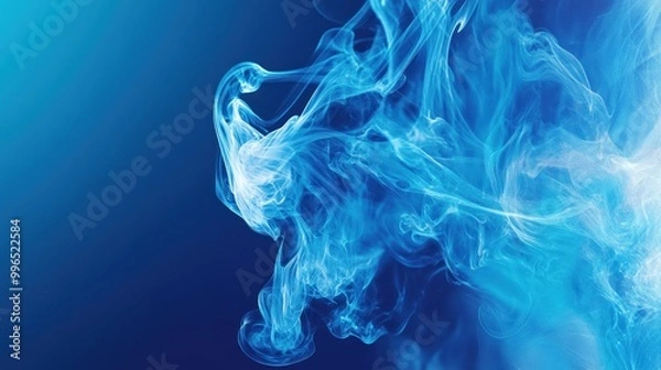 Fototapeta Intricate blue smoke swirling gracefully against a deep blue background.