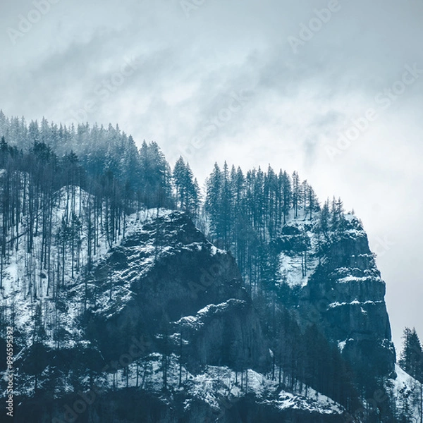 Obraz moody snowy mountain cliffside landscape