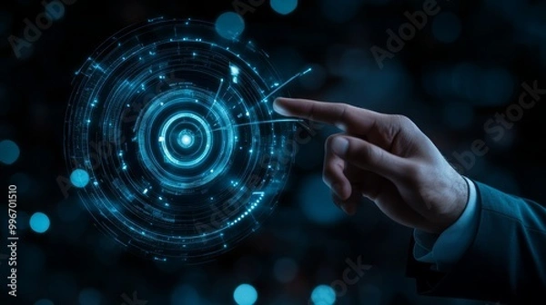 Fototapeta Target concept with a glowing hologram of bullseye and arrow hitting the center. Growth strategy. Goals achievement, success. Close up of businessman hand using hud screen on blurry dark background 