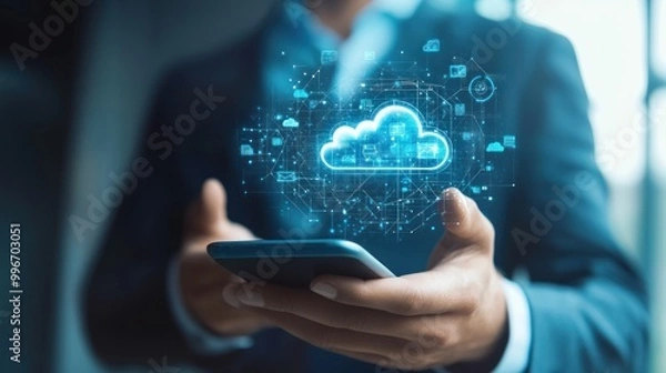 Fototapeta Businessman using smartphone with cloud computing and network technology hologram.