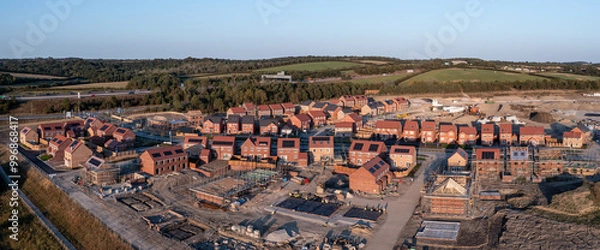 Fototapeta Aerial panoramia view directly above a new build housing estate in the UK