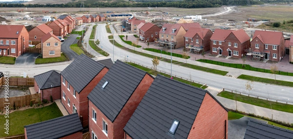 Fototapeta Aerial panoramic view of a new build housing estate in the UK on a brownfield site