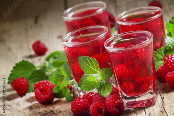 Obraz Refreshing raspberry drink with berries and mint, selective focu