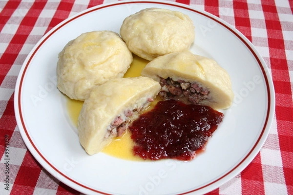 Fototapeta Swedish dish "Kroppkakor" with bacon and whortleberry