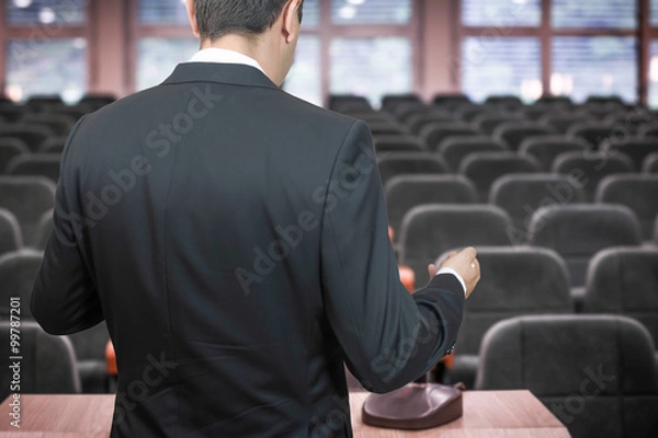 Fototapeta Practising speech in empty hall