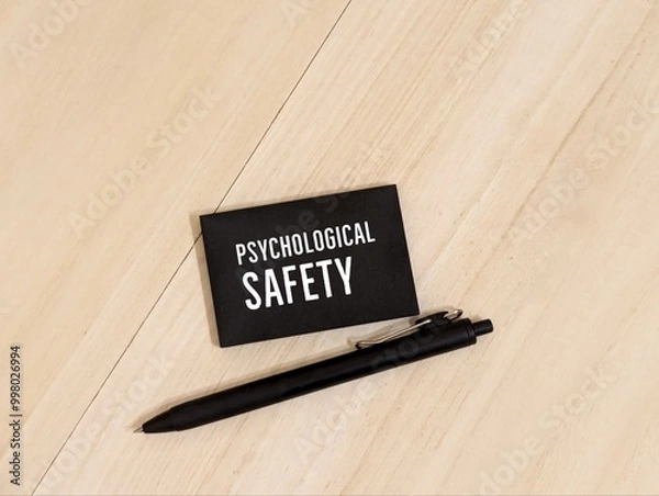 Obraz a black pen and sticky note with the words Psychological Safety. Psychological concept