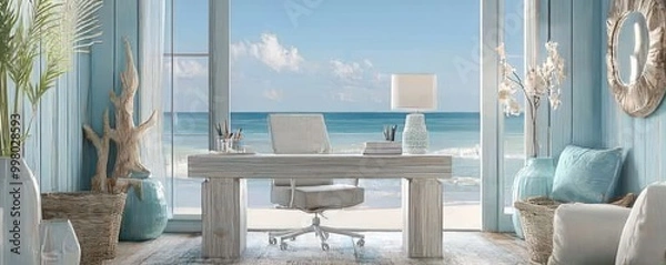 Fototapeta Home office with a serene coastal theme, featuring light blues and sandy tones, driftwood decor, and a view of the ocean Calming and refreshing