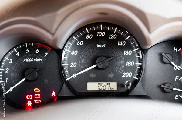 Obraz Close up of car dashboard and Odometer.